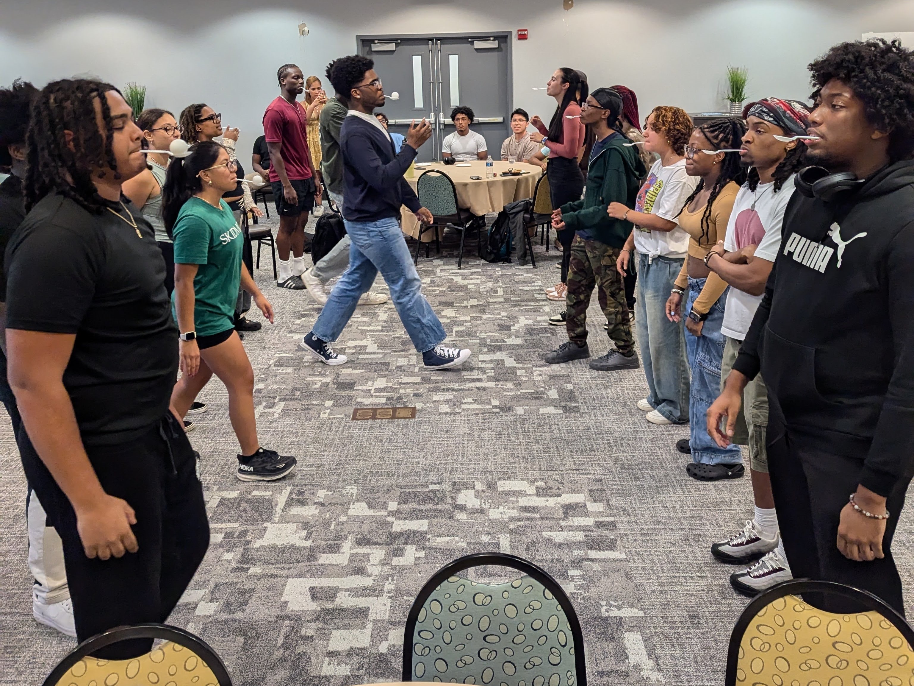 Students playing an egg drop game