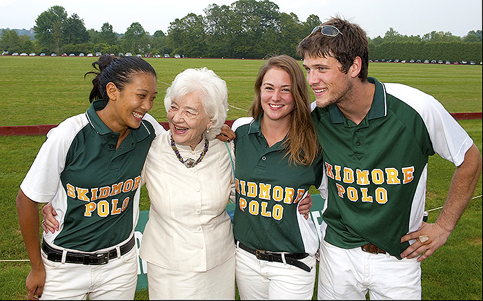 Anne Palamountain with Skidmore Polo players at the annual polo benefit.