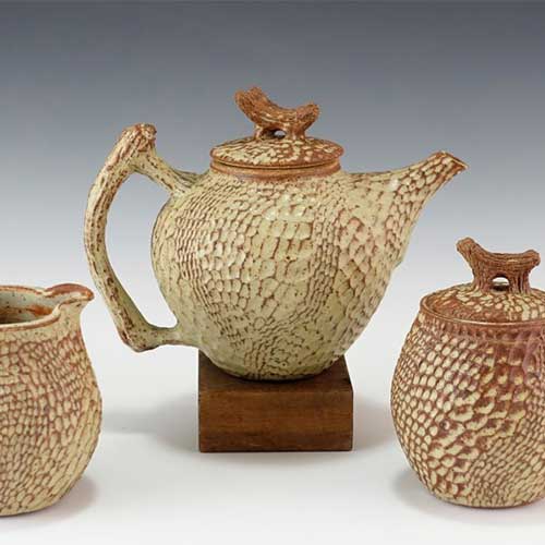 Carved Teapot with matching Sugar and Creamer