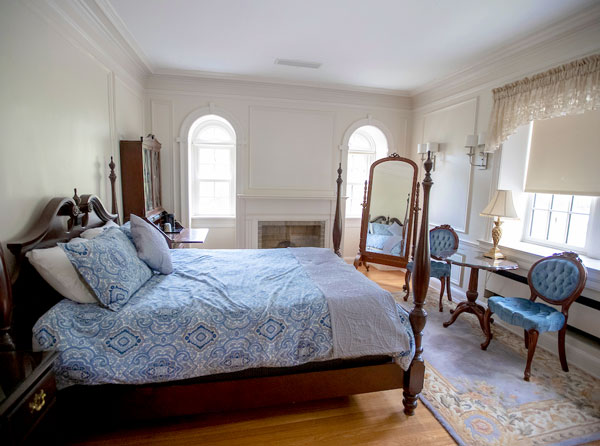 Guest Room with bed, mirror