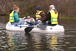 Students monitoring water quality on Loughberry Lake in ES 105