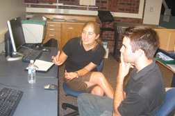 Alison Barnes and Adam Wallace '06 developing the WRI website